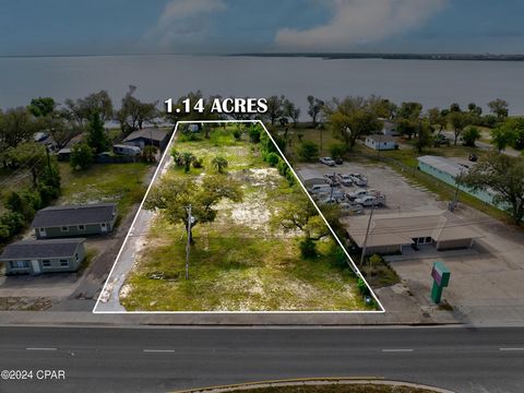 Multi Use 2 (MU2) cleared 2 lots one price over 1 Acre Residential or Commercial. (PID ... & PID ... ft 4-lane frontage w/median & turn lane plus 120 ft waterfront East Bay w/Gulf Access and near Tyndall AFB. All info deemed reliable, buyer to verify...