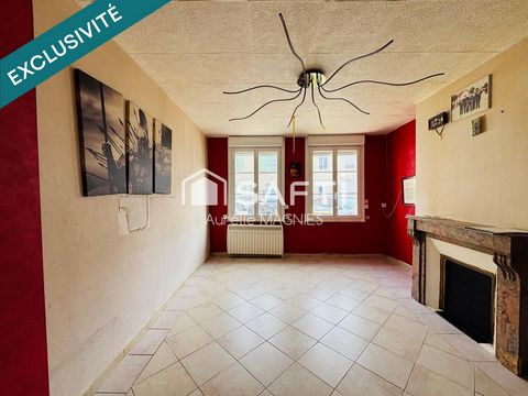 Maison de ville avec beau potentiel