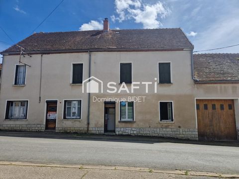 Maison double avec cour intérieure. 3 garages.