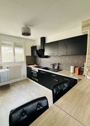 Charmante maison mitoyenne dans secteur prisé