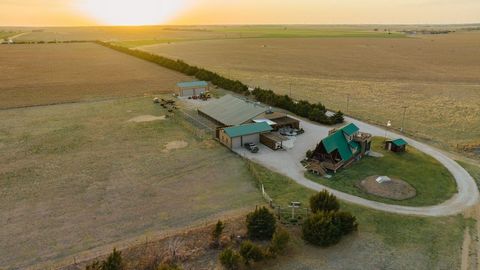 Location: Located 9 miles south of Offerle, KS and US 50 E/ US 56 E highway and 28 miles east off Dodge City, KS. Address: 2286 20th Ave, Offerle, KS 67563Land: Nestled along the tranquil Arkansas River, this remarkable property offers a haven of sec...
