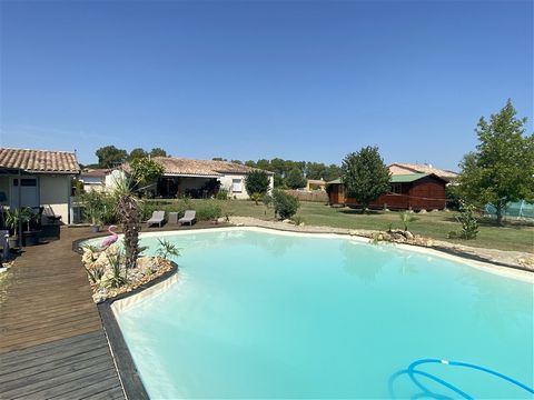 Exclusive.   Ideally located between Villeuneuve sur Lot and Fumel. Close to the Lot river in the commune of Trentels. House with swimming pool, pool house, landscaped garden and outbuildings with countryside views. Comprising an entrance hall, livin...