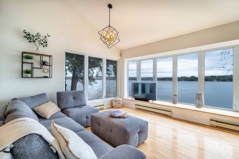 Nestled along the shores of Lake Memphremagog, this property offers exceptional views of Fitch Bay from its 230 feet of shoreline. Set on a vast lot, it blends perfectly into its natural surroundings. The home's panoramic windows and spacious terrace...
