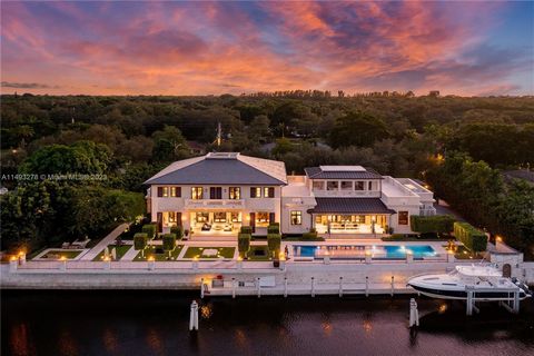 Masterful design & luxury are showcased in this 6BD, 7BA, 4HB custom-built waterfront home in highly-sought after Coral Gables. Enjoy the epitome of WF living w/ 200' on the water, views of manatees & a refreshing ocean breeze. The outdoors captivate...