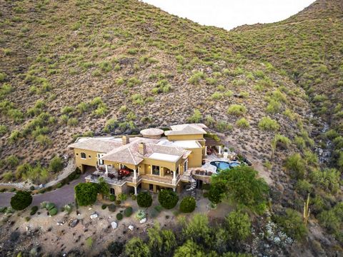 Perched on one of the highest homesites in Scottsdale Arizona's McDowell Mountain Preserve, this magnificent mountaintop villa offers views of Four Peaks Mountain, the Superstition Mountains and the charming community of Fountain Hills. When your lif...