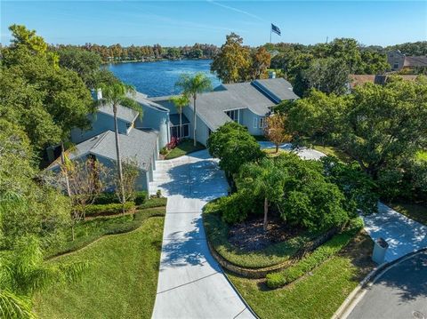Welcome to this amazing lakefront estate in Avila, Tampa Bay's Premier, guard-gated, golf and country club community! This residence is one of only a handful of estates in Avila that are located on Lake Chapman, the only ski size lake in Avila. The p...