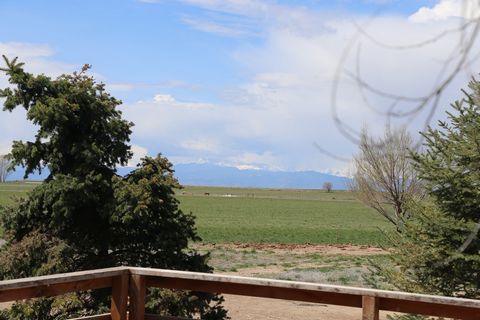 Nestled amidst the expansive Colorado hay and wheat fields, this property offers a captivating panorama of the majestic Rocky Mountains, providing an unparalleled opportunity to possess a slice of heavenly serenity. Known as Severance Retreat, this h...