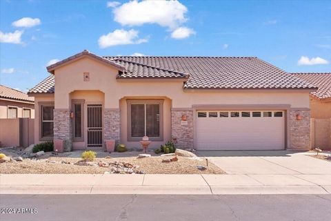 This spectacular home is located in McDowell Mountain Ranch's desirable, gated Castle Chase subdivision. Largest floor plan in Castle Chase. Lot offers a private setting w/ upgrades featuring an automated cantilevered patio shade (pergola-like struct...