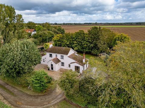 With a setting on a peaceful rural lane yet within a short drive from Dereham, this stylish five-bedroom character property offers almost completely unhindered views of the surrounding unspoilt countryside. Light and airy throughout with some wonderf...