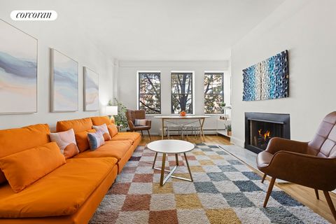 This spacious two-bedroom apartment offers a perfect blend of comfort and convenience, featuring one and a half baths along with a sun-filled living, dining, and kitchen area accentuated by three oversized windows. Cozy up by the wood-burning firepla...