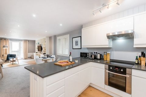 Beautiful first-floor, two-bed, two-bath apartment on a quiet street in the Barbican area, just minutes from the city centre. With modern finishes, an open-concept layout, sleek kitchen, and balcony views, this apartment is perfect for entertaining. ...