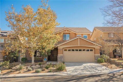 This stunning and meticulously maintained two-story home is nestled in the desirable West Hills community of Summerlin North. Recently updated with 4 bedrooms and a loft, this spacious home offers plenty of room for comfortable living. The large livi...