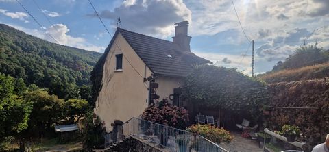 Maison de caractère avec terrain, garage, potager et sous-sol aménagé