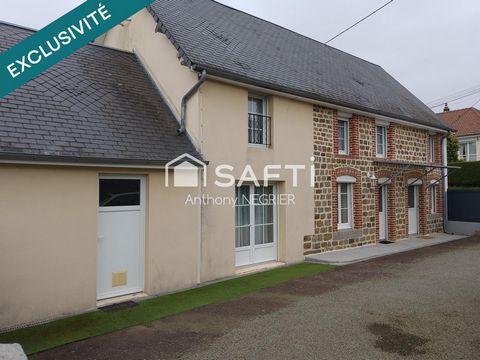 Maison avec garages et jardin