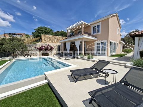Luxury villa with pool, sea view and private garden In a quiet part of the coast near Rogoznica, on a gentle hill with an open view of the sea and the Šibenik archipelago, there is a modern villa that perfectly combines luxury, comfort and a touch of...
