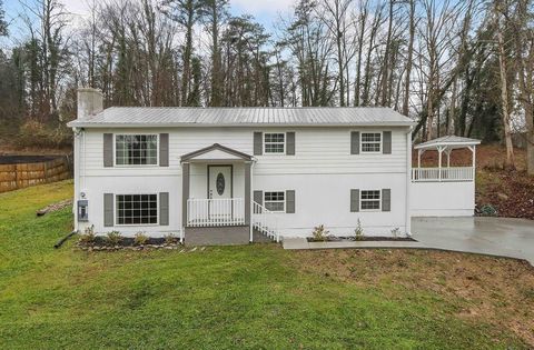 Welcome Home! This turn key, spacious, open concept home has tons of natural light, a cozy yet roomy feel, and a very practical layout! Upstairs you have a very spacious kitchen with tons of counter space that is open to your dining area and living r...