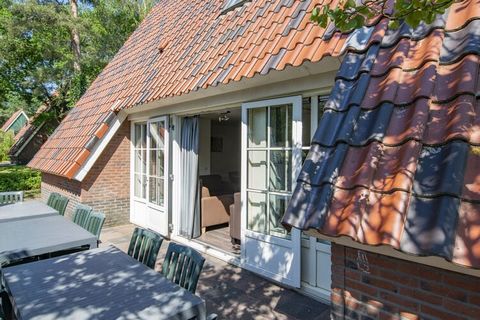 This detached, restyled 14-pers. holiday home is located at the wooded holiday park De Katjeskelder, not far from De Biesbosch National Park and yet only 10 km from the pleasant city of Breda. The comfortable holiday home occupies three floors. On th...