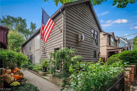Location, location, location! Gorgeous updated luxury duplex with central air, skylights, vaulted ceilings, & tons of character due to its roots as a blacksmith barn & shop: exposed original brick, exposed original beams, exposed barn wood feature wa...