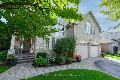 EXQUISITE 5 bedroom, 5 bathroom family home, situated on a mature PREMIUM pie-shaped lot, located on a quiet circle in one of the most DESIRABLE streets in Glen Abbey. Fully-fenced backyard is an oasis with lush gardens (I/G sprinklers), heated in-gr...