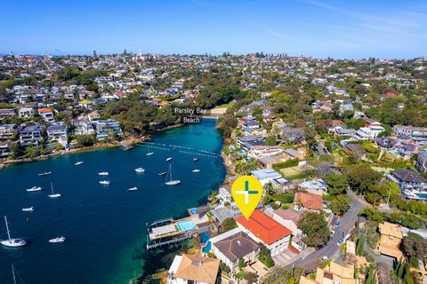 Superbly Positioned Harbourside Apartment Only Footsteps From The Beach. Great Investment/1st Home Buy Nestled in a serene cul-de-sac, this ground-floor apartment is perfectly positioned just moments from the stunning harbour foreshore. Glimpses of P...