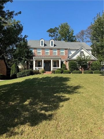 Welcome to this beautiful, thoughtfully designed 5-bedroom, 4.5-bath home nestled in the sought-after Notting Hill community, located in the West Forsyth School District. From the moment you pull into the driveway, you’ll fall in love with the timele...