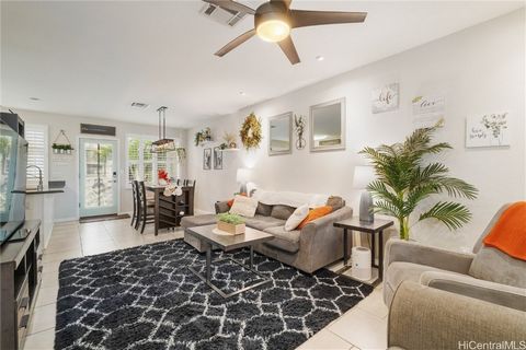 Welcome to resort style living at Hoakalei! If you’re looking for a move-in ready townhome residence that shows pride of ownership, look no further. This upgraded unit offers high end finishes including plantation shutters, front loading laundry upst...