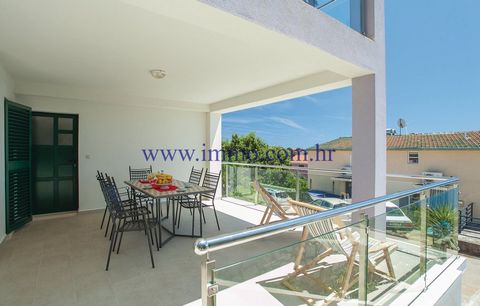 Newly built villa with nicely decorated yard for sale, situated in a quiet location on the southern side of the island of Korčula, only 70 m from the sea. It consists of one 3-bedroom apartment and two 1-bedroom apartments, which are connected with o...