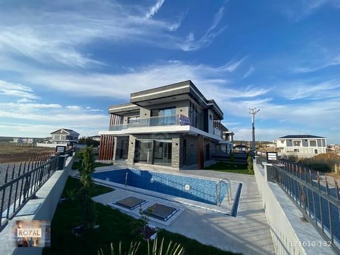 New luxury detached villa in Didim, Altinkum, Turkey. The villa has 4 bedrooms 3 bedrooms livingroom with open planning kitchen and balconies and outside come with large garden and a a large swimming pool. 50-60 minutes from Bodrum international Airp...