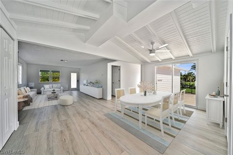 A charming cottage tucked away in one of Sanibel's most coveted locations with a neighborhood kayak and boat launch only steps away. Newly remodeled, this home features a chic wide plank laminate floor, two living spaces, a gorgeous kitchen with quar...
