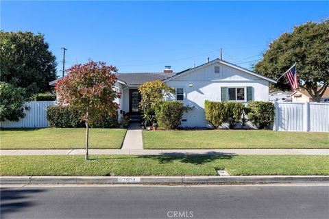 Must see charming mid-century modern four bedroom home with remarkable curb appeal in centrally located Buena Park! Inside features noticeable renovations such as a remodeled kitchen with quartz countertops with wood cabinets, slate tile floors, rece...
