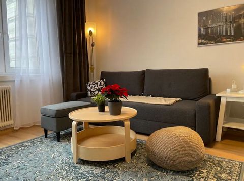 A beautiful, newly renovated flat in a quiet, well-connected neighbourhood. The flat has a double bed and a sofa with bed function. Tram 1 takes you to the opera in 15 minutes. We offer FREE of charge: ✔Self check-in ✔High-speed internet ✔Smart TV wi...