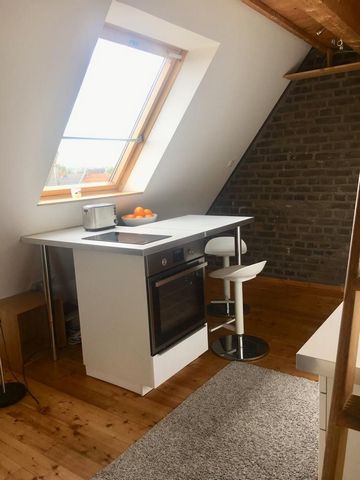 This cozy apartment on the 5th floor (without elevator) is located in the heart of Sülz. The 2m kingsize-bed is located on a gallery under the roof. Below is the living/dining area with bathroom and the balcony with a view of the cathedral. There are...