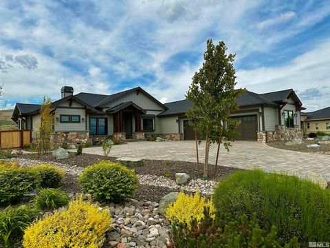 Introducing a pristine and meticulously crafted custom modern residence, showcasing unrivaled craftsmanship and nestled in a premier estate lot within the exclusive gated community of Summit Ridge at Genoa Lakes Golf Resort. This brand-new mountain r...