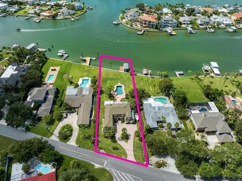 This executive estate is located in the most coveted area of waterfront properties in Pinellas County. Sitting at a higher elevation in Zone B with no flood insurance requirement and no mandatory evacuation required for seasonal storms. A boat dock w...