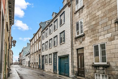 IN THE HEART OF OLD QUEBEC: Unique with character! Backed by the Seminary and 2 steps from everything: Dufferin Terrace, Château Frontenac, St-Jean Street and + more. Superb open concept condo, offering: 2 mezzanines, intimate entrance hall, stone wa...