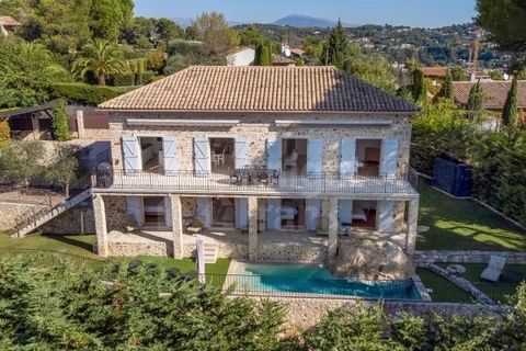 This quaint Provençal stone bastide of 210m² was recently renovated and enjoys a peaceful environment in a highly sought-after area of Mougins, close to all local amenities and schools. The spacious and luminous open-plan kitchen and living area feat...