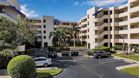 Central Park! No hurricane damage from Helene or Milton—this unit and its buildings remain untouched and in excellent condition. Nestled along the serene Hudson Bayou, surrounded by lush banyan trees and swaying palms, this six-acre, park-like commun...