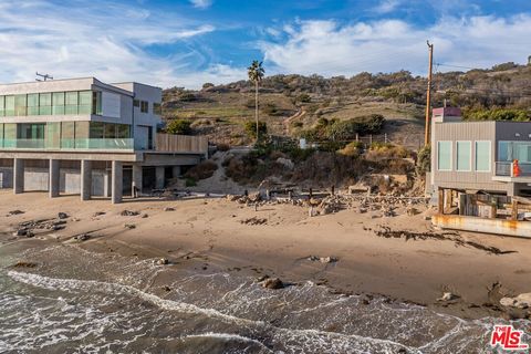 24266 Malibu Road boasts a central oceanfront location envied worldwide. This 90-ft double wide lot presents the opportunity to build a brand new beachfront home, with an active permit in hand and the foundation work has already started. Settle into ...