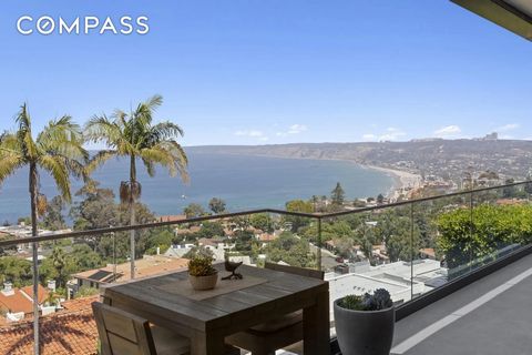 Set high in the prestigious Country Club neighborhood, this gorgeous estate captures sweeping ocean vistas and unforgettable sunsets. Surrounded by the natural beauty of the hills, the home offers a rare blend of privacy, elegance, and breathtaking s...