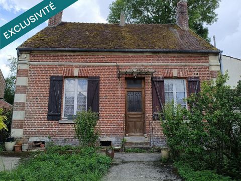 Charmante bâtisse en briques dans un bourg proche Noailles