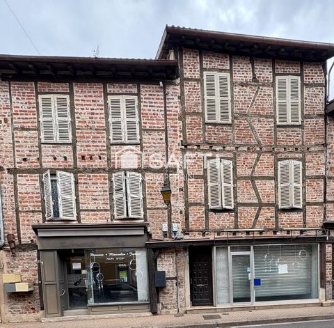 IMMEUBLE AVEC LOCAUX COMMERCIAUX