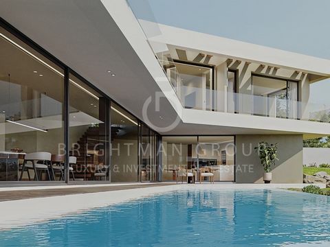 Villa de 4+1 chambres d'une surface de construction brute de 507 m², avec piscine et jardin de 1 480 m², à l'architecture moderne, sur 3 étages et offrant une vue imprenable sur la mer, à Azenhas do Mar, Sintra. Au rez-de-chaussée se trouvent un gran...