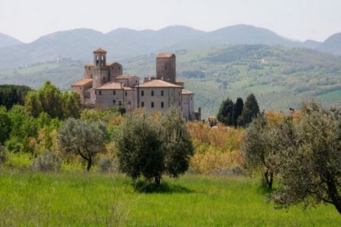 Charming castle with inside 15 apartments finely restored. Castello Izzalini is placed on a hilltop, near the border with the Tiber Valley, an ancient medieval hamlet built at the beginning of XIII Century, and is one of the most evocative villages a...