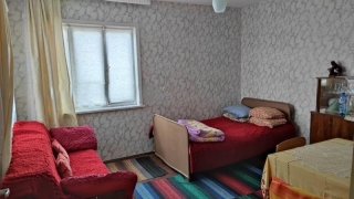 \nVARNA DISTRICT, DOLNI CHIFLIK MUNICIPALITY Well preserved and taken\ncare of Two-Storey house ready to live in, with outbuildings, garage\nand 2300m2 land in a quite villages which has a train station, 2 food\nshops and a town hall. The property is...