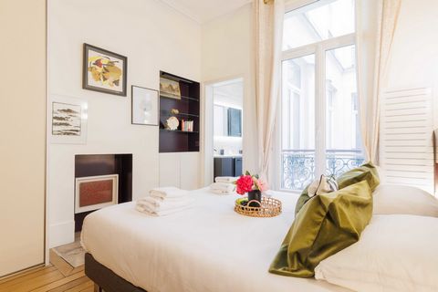 This superb apartment is located on the 2nd floor (no elevator) of a typical Parisian building and comprises : A superb living room with sofa Dining area with dining table A well-equipped and functional kitchen: fridge, oven, dishwasher, induction ho...