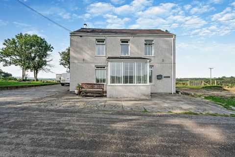 The stunning open countryside views will make you feel like you're living in a postcard, with rolling hills and green fields as far as the eye can see. Moving inside, the house boasts four bedrooms, perfect for a growing family or hosting all your fr...