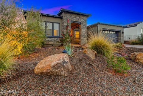 ENJOY YOUR OWN PRIVATE POOL & Experience LUXURY LIVING in this beautiful Cordoba Residence located in the coveted Trilogy at Verde River. Inviting exterior with stack stone leads you into an open floor plan with an alluring great room, striking kitch...