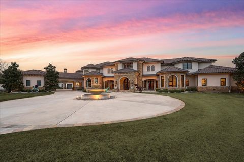 Welcome to an extraordinary luxury estate nestled on 4.828 acres of pristine land, epitomizing opulence & exclusivity. The remarkable residence, located in Carroll ISD, one of Texas's most esteemed school districts, offers unparalleled amenities for ...