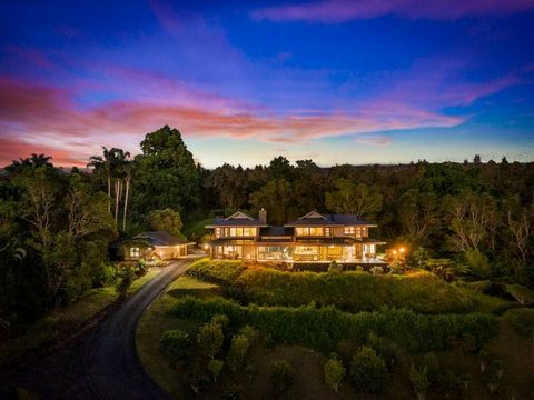 Welcome to this extraordinary two-story residence that was featured in West Hawaii Today's 