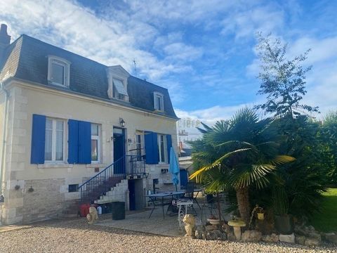 A stone's throw from Bourges train station, come and discover this 1880 house with the charm of the old. With a surface area of 162m2 it has a through entrance with storage cupboards, a living room with fireplace and parquet flooring, an adjoining li...